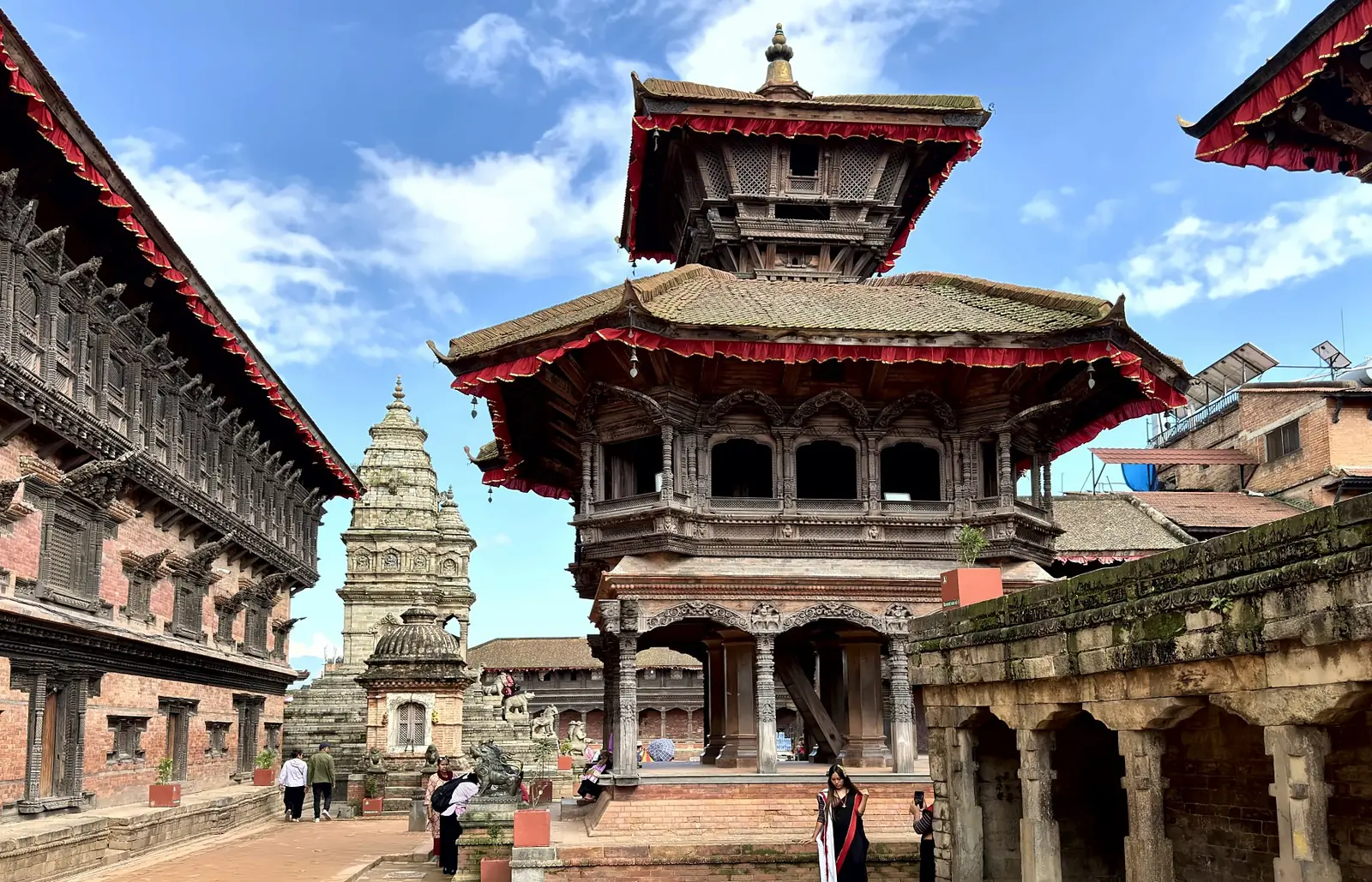 Two-tiered pagoda temple with carved wooden windows in Bhaktapur Durbar Square