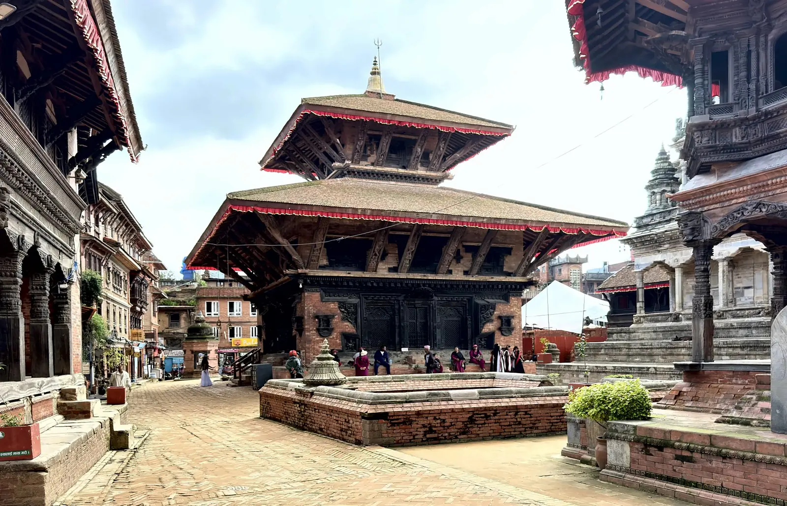 Large two-tiered pagoda temple and paved courtyard in Bhaktapur Durbar Square