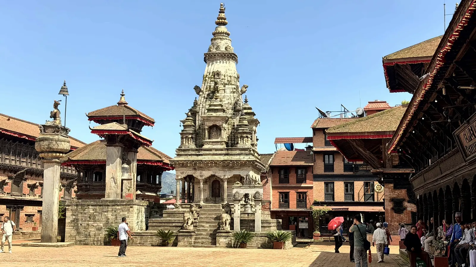 Stone Vatsala Durga temple and King Bhupatindra Malla's column in Bhaktapur Durbar Square
